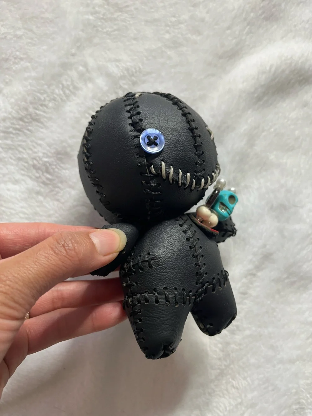 Black Stitched Voodoo Doll Keychain with Turquoise Skull Charm